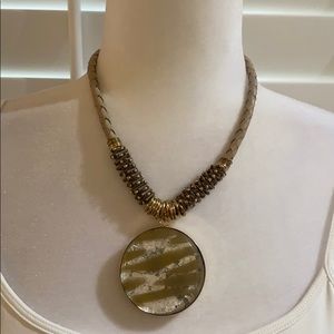 A taupe, silver and gold necklace!